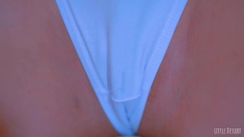 Sultry Latina flaunts her plump derriere in a white thong beneath a blue dress