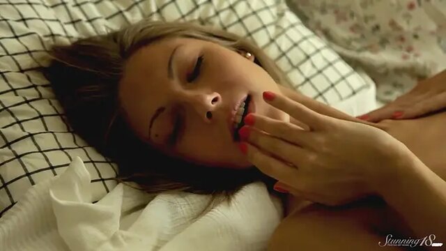 Skinny blonde teen Anjelica fingering her wet pussy