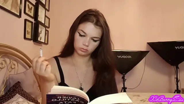 Submissive bunny smokes and turns away from you