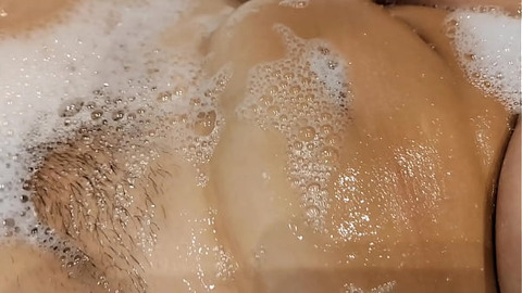 Tanned big tits stepsister in bathroom playing with pussy and tits