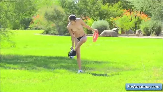 Teen cutie plays with toys in public