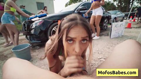 'Tight-skinned blonde teens give sloppy head and hand job to massive dicks under car wash charity'